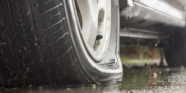 How To Change A Flat Tire