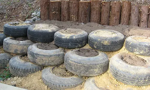 Earthship wall made out of old tires