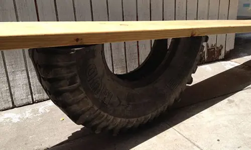 portable seasaw tractor old tire use