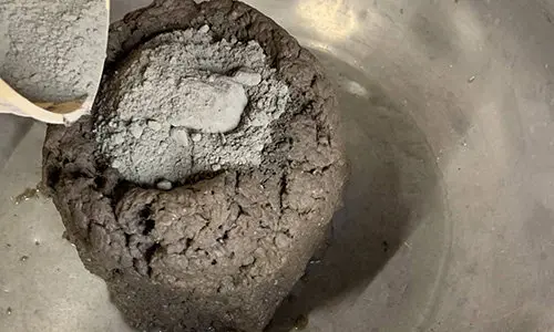 adding cement to papercrate