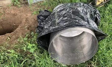 Why You Should Bury A Trash Can In Your Backyard