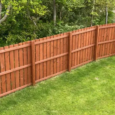 photo of a regular wooden fence