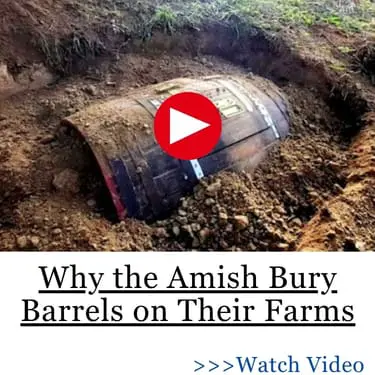 Why the Amish Bury Barrels on Their Farms Photo of a buried barrel in the ground
