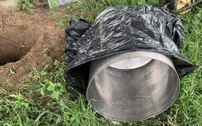 Why You Should Bury A Trash Can In Your Backyard