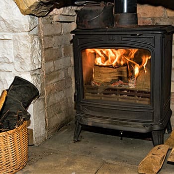 The Most Important Project You Need to Make This Winter on Your Property - wood burning stove 