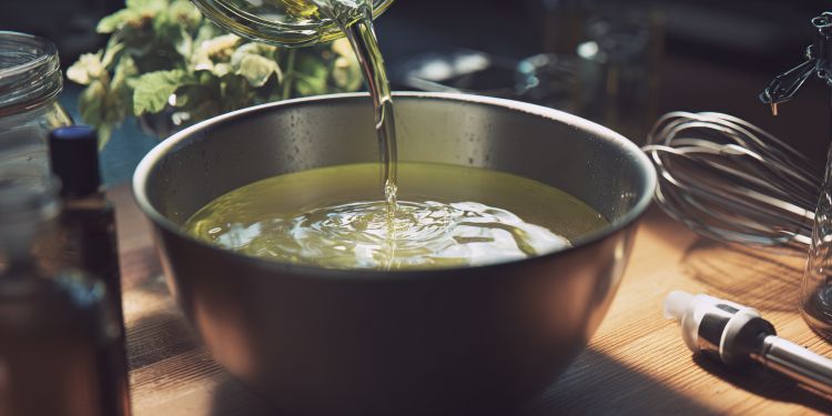 pour lye mixture into infused oils