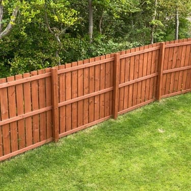 photo of a regular wooden fence