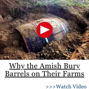Why the Amish Bury Barrels on Their Farms Photo of a buried barrel in the ground
