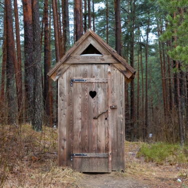 outhouse in the woods